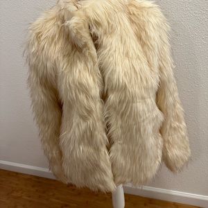 Women’s faux fur jacket. Great for holiday parties